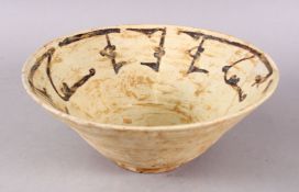 A GOOD IRAN STYLE POTTERY BOWL, decorated formal stylized script decoration in black upon beige