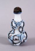 A GOOD CHINESE OVERLAY PEKING GLASS & AMBER GOURD FORMED SNUFF BOTTLE, the gourd formed snuff bottle