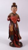 A CHINESE WOOD & LACQUER FIGURE, the figure stood holding a vessel, 43cm high
