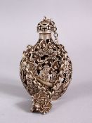 A CHINESE WHITE METAL OPENWORK SNUFF BOTTLE, with decoration in openwork and depicting immortal