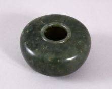 A CHINESE CARVED MOSS GREEN JADE INSCRIBED BUSH WASH, with five character inscription, 5.5cm