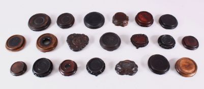 A MIXED LOT OF 20 CHINESE CARVED HARDWOOD STANDS - each of varying size, style and timber, the