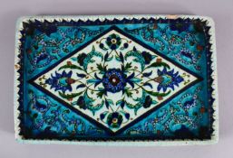 A 19TH CENTURY OTTOMAN TURKISH KUTAHYA POTTERY TRAY, decorated in iznik style with floral motif