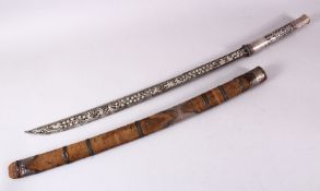 A FINE 19TH CENTURY BURMESE DHA SWORD with niello inlaid handle and fine silver inlaid blade, with