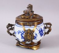 A CHINESE BLUE & WHITE JAR & COVER, with metal mounts and cover, the body with figures, birds and