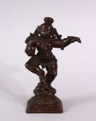 A FINE 17TH/18TH CENTURY INDIAN BRONZE FIGURE of baby Krishna, 11cm high.