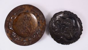 TWO JAPANESE MEIJI PERIOD SOFT METAL / ANTIMONY DISHES - KWANNON - DRAGON, the larger in fine detail