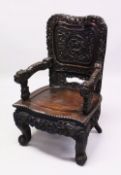 A GOOD 19TH/20TH CENTURY CHINESE CARVED ROSEWOOD CHAIR, the crest carved with a dragon holding the