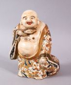 A JAPANESE MEIJI PERIOD SATSUMA IGURE OF HOTEI, stood aside his treasure sack, the robes detailed