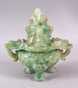 A CHINESE CARVED GREEN QUARTZ TWIN HANDLE VASE AND COVER, with lion dog carved finial's, upon tripod