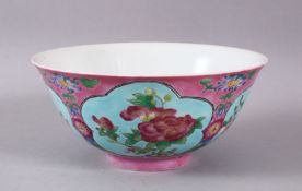A CHINESE FAMILLE ROSE TURQUOISE & PINK GROUND PORCELAIN BOWL, decorated with panels of native