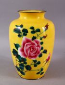 A JAPANESE CLOISONNE ANDO STYLE FLORAL VASE, the bright yellow ground with a floral display, metal