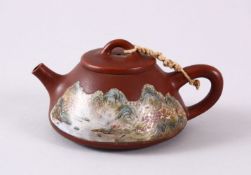 A CHINESE YIXING CLAY PAINTED TEAPOT - the body decorated with a landscape view in famille rose, the