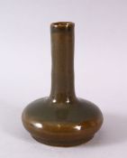 A CHINESE TEA DUST GLAZE PORCELAIN VASE, the body with a graduated tea dust glaze, base with an