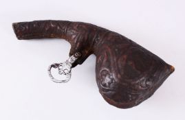 A GOOD 19TH CENTURY PERSIAN LEATHER POWDER FLASK, with embossed decoration of animals, 25cm
