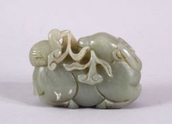 A GOOD CHINESE CARVED JADE FIGURE OF A DEER & DUCK, the duck upon the recumbent deer back, with