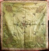 A 19TH CENTURY TURKISH OTTOMAN EMBROIDERED SILVER SILK TEXTILE, inlaid with birds and foliage in