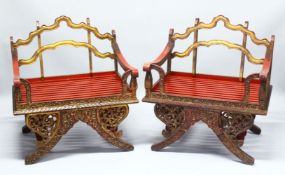 A PAIR OF 19TH/20TH CENTURY THAI CARVED HOWDAH ELEPHANT CHAIRS, profusely carved and pierced with