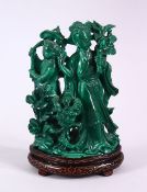 A CHINESE CARVED MALACHITE FIGURE OF TWO FEMALES, both carved stood in traditional gowns holding