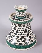 AN UNUSUAL 19TH CENTURY FRENCH SAMSON ISLAMIC IZNIK STYLE POTTERY CANDLESTICK, the stick decorated