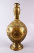 A LARGE 19TH / 20TH CENTURY INDIAN BRASS RELIEF VASE, the body with panels of figures in relief