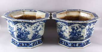 A PAIR OF LARGE CHINESE BLUE & WHITE OCTAGONAL PORCELAIN JARDINIERE / PLANTERS, decorated with