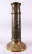 A VERY FINE AND LARGE PERSIAN QAJAR TORCH STAND, with pierced engraved and chased decoration, 53cm