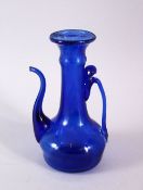 AN 18TH CENTURY PERSIAN BLOWN GLASS EWER, 14CM.