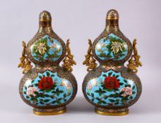 A PAIR OF CHINESE CLOSIONNE DOUBLE GOURD FORMED BOTTLES & COVERS, each decorated with four main