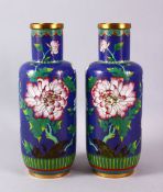A PAIR OF CHINESE CLOISONNE BLUE GROUND VASES - each with a royal blue ground and native display