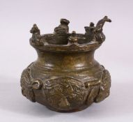 AN EARLY SOUTH INDIAN BRONZE BOWL, the bowl with animal decoration to the rim including snake & ram,