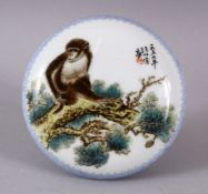 A CHINESE REPUBLIC STYLE FAMILLE ROSE PORCELAIN MONKEY BOX & COVER, decorated with scenes of a