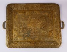 A LARGE 19TH CENTURY SRI LANKAN TWIN HANDLED BRASS TRAY, embossed and engraved with animals and