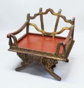 A 19TH/20TH CENTURY THAI CARVED HOWDAH ELEPHANT CHAIR, profusely carved and pierced with gilt