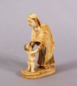 A RARE EARLY 19TH CENTURY INDIAN CARVED IVORY FIGURE of a Parsi woman and child, 5.5cm