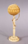 A FINE 18TH CENTURY SRI LANKAN CARVED IVORY BILBOQUET, overall height 14cm.