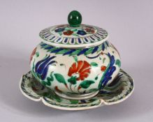 A 19TH CENTURY IZNIK STYTLE POTTERY CANTAGALLI LIDDED BOWL & DISH, decorated with floral motif