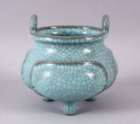 A CHINESE PALE BLUE GUAN GLAZED PORCELAIN TRIPOD CENSER, with moulded panel section, tripot feet and