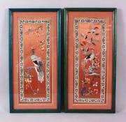A PAIR OF 20TH CENTURY CHINESE EMBROIDERED PICTURES, embroidered to depict peacock upon branches
