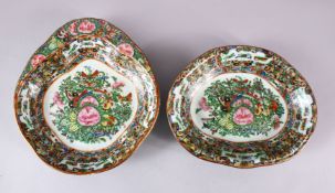 TWO CHINESE 19TH CENTURY CANTON FAMILLE ROSE PORCELAIN DISHES, each decorated with panels of lotus