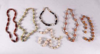 A MIXED LOT OF ISLAMIC / TURKISH CARVED STONE BEADS, varying size and styles.