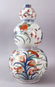 A 18TH / 19TH CENTURY CHINESE FAMILLE VERTE TRIPLE GOURD PORCELAIN VASE, decorated with an array