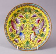 A CHINESE FAMILLE JAUNE OR YELLOW GROUND PORCELAIN DISH, decorated with twin birds amongst flora,