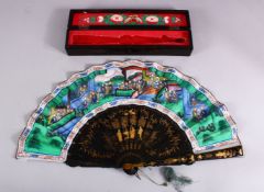 A CHINESE BOXED PAINTED & IVORY SLITHER FAN, with a painted fan with inset ivory slither faces, with