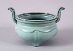 A CHINESE SONG STYLE CELADON POTTERY TWIN HANDLE CENSER, the body with a pale green celadon glaze,