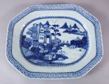 AN 18TH CENTURY CHINESE BLUE & WHITE PORCELAIN SERVING DISH, decorated with native landscape