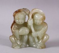 A CHINESE CARVED CELADON JADE FIGURE OF TWO BOYS, both seated holding branches, 8cm.