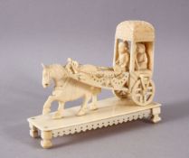 A 19TH CENTURY INDIAN CARVED IVORY CONVEYANCE, 11cm long.