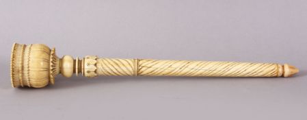 A VERY FINE 17TH/18TH CENTURY MUGHAL INDIAN CARVED IVORY FLY WHISK HANDLE, 28cm long.