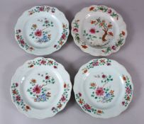 FOUR 18TH CENTURY CHINESE FAMILLE ROSE PORCELAIN PLATES, each decorated with floral spray